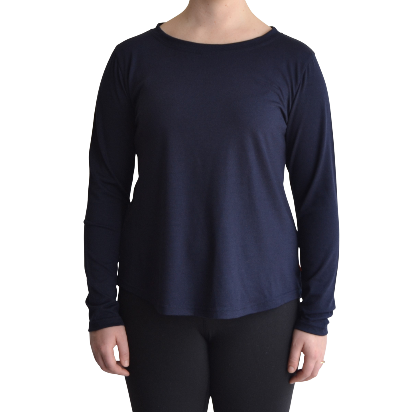 Links long sleeve merino top in navy blue colour, model faces forward showing the front of the top with scooped neck and hemline..