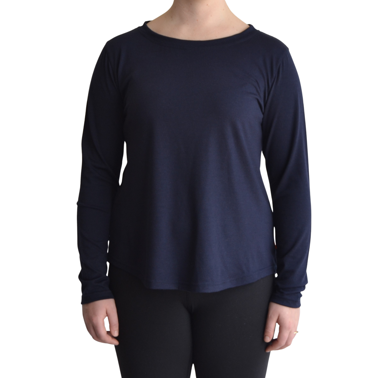 Links long sleeve merino top in navy blue colour, model faces forward showing the front of the top with scooped neck and hemline.. 
