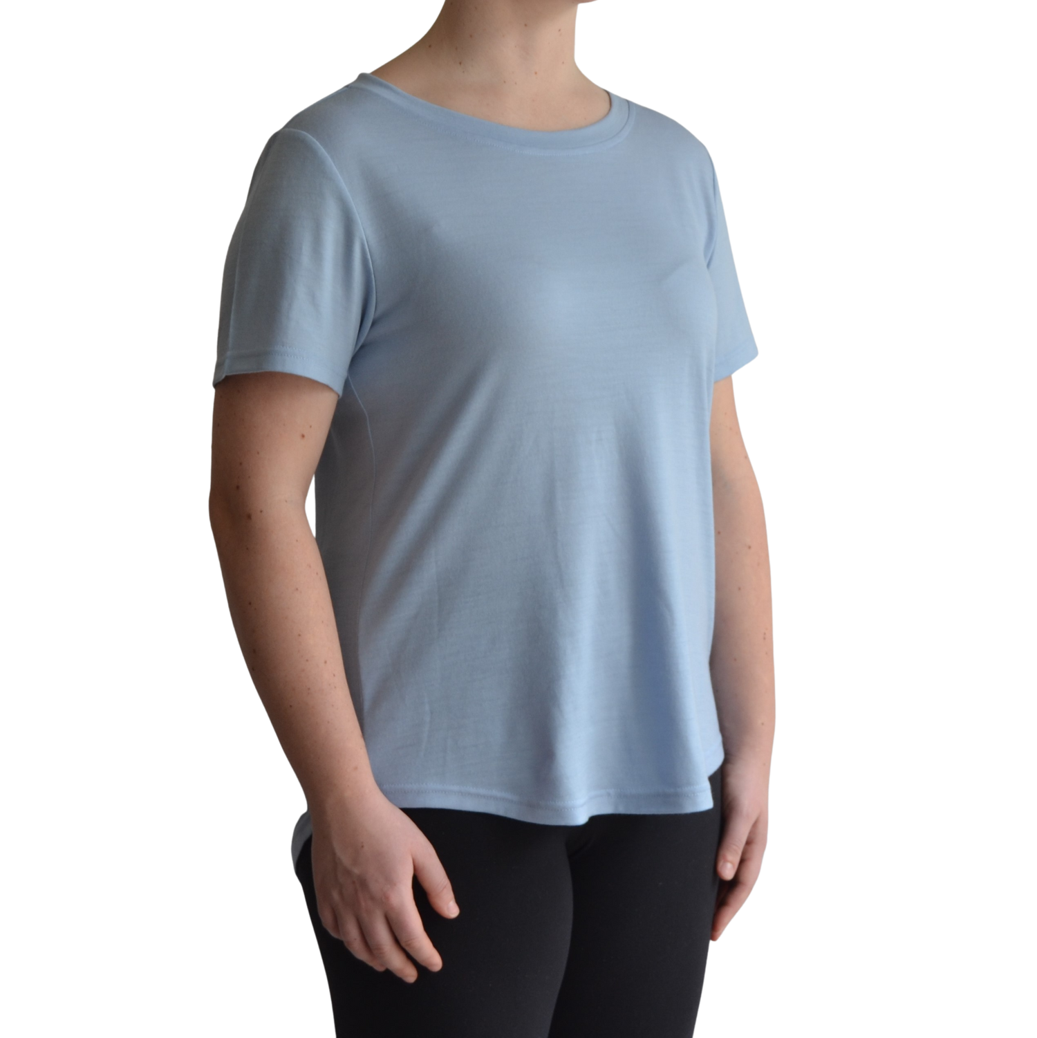 Links merino short sleeve t-shirt in ice blue. Model faces forward on a 45 degree angle