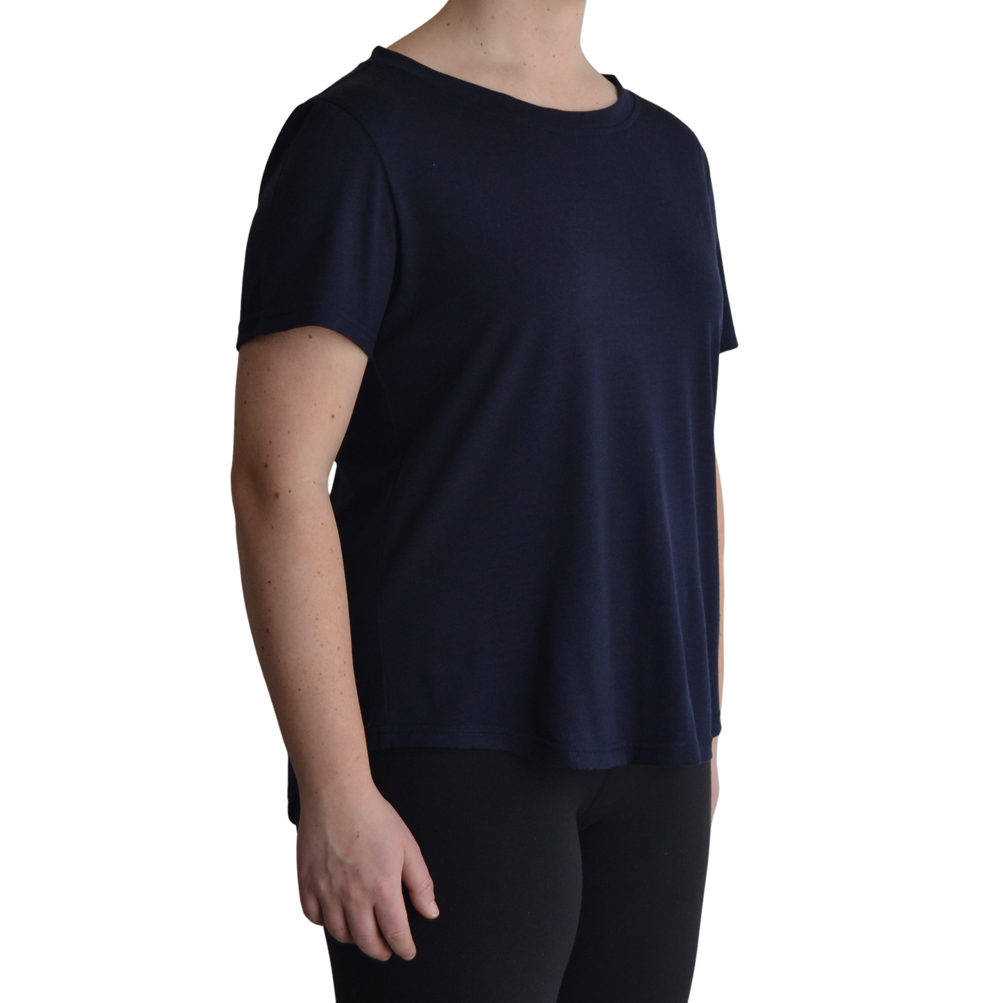 Links merino short sleeve t-shirt in navy blue. Model faces forward on a 45 degree angle